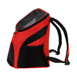 Red and black pet carrier backpack with mesh ventilation windows and adjustable shoulder straps, shown on a plain white background.
