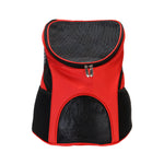 Red and black pet carrier backpack with mesh ventilation panels and a top zipper, shown on a plain white background.